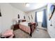 Bright bedroom with a full bed, carpeted floors and lots of light at 30186 W Pinchot Ave, Buckeye, AZ 85396