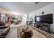 Open-concept floor plan with living room flowing into the dining area and kitchen at 30186 W Pinchot Ave, Buckeye, AZ 85396