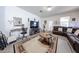 Cozy living room features a decorative rug and ample seating at 30186 W Pinchot Ave, Buckeye, AZ 85396