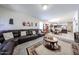 Open-concept floor plan with living room flowing into the dining area and kitchen at 30186 W Pinchot Ave, Buckeye, AZ 85396