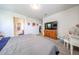 This main bedroom has a carpet, with access to the bathroom and walk-in closet at 30186 W Pinchot Ave, Buckeye, AZ 85396