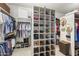 Walk-in closet offering custom shelving, ample storage, and organized clothing racks at 3146 E Maryland Ave, Phoenix, AZ 85016
