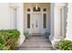 Elegant entryway featuring a detailed front door with sidelights and decorative glass at 3146 E Maryland Ave, Phoenix, AZ 85016