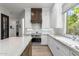Bright kitchen boasts modern appliances and marble countertops at 3146 E Maryland Ave, Phoenix, AZ 85016