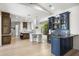 Open floor plan features a dining area, a wet bar and kitchen at 3146 E Maryland Ave, Phoenix, AZ 85016