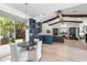 Open concept living space features dining area, wet bar, and sight lines to the living room at 3146 E Maryland Ave, Phoenix, AZ 85016