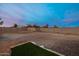 Vast backyard featuring fencing, a small grass area, and plenty of room for landscaping or other amenities at 38106 N 2Nd Ln, Phoenix, AZ 85086