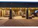 Outdoor patio area at twilight with brick pavers, outdoor furniture and lighting at 38106 N 2Nd Ln, Phoenix, AZ 85086