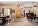 Grand foyer with natural wood door and gorgeous tile compass in the center at 38106 N 2Nd Ln, Phoenix, AZ 85086