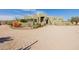 Lovely desert landscaping and light green stucco facade make this home inviting at 38106 N 2Nd Ln, Phoenix, AZ 85086