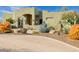 Beautiful home with desert landscaping, cacti, and gravel circular driveway at 38106 N 2Nd Ln, Phoenix, AZ 85086