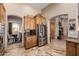 Kitchen area with stainless steel refrigerator, cabinets and breakfast area at 38106 N 2Nd Ln, Phoenix, AZ 85086