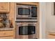 Kitchen featuring stainless steel microwave and oven at 38106 N 2Nd Ln, Phoenix, AZ 85086