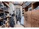 Organized walk-in closet featuring custom wood shelving and drawers for clothing and accessories at 38106 N 2Nd Ln, Phoenix, AZ 85086