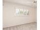 A sunlit bedroom features shuttered windows and plush neutral carpet at 3913 N 86Th St, Scottsdale, AZ 85251