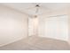 Bedroom with two closets and neutral carpeting at 3913 N 86Th St, Scottsdale, AZ 85251