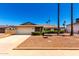 Well-maintained single-story home with a two-car garage and desert landscaping for low maintenance and curb appeal at 3913 N 86Th St, Scottsdale, AZ 85251
