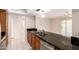 Well-equipped kitchen featuring granite counters, stainless steel appliances, and a breakfast bar at 3913 N 86Th St, Scottsdale, AZ 85251
