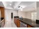 Updated kitchen showcasing a breakfast bar, stainless appliances, and a bright layout at 3913 N 86Th St, Scottsdale, AZ 85251