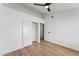 Clean bedroom with wood flooring, closet, and white walls at 3955 W Cindy St, Chandler, AZ 85226