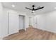 Clean bedroom featuring ample closet space and wood laminate flooring at 3955 W Cindy St, Chandler, AZ 85226