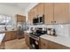 Beautiful kitchen featuring stainless steel appliances, light wood cabinets, and white countertops with a subway tile backsplash at 3955 W Cindy St, Chandler, AZ 85226