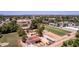 Aerial view of horse property with barn, stables, and outdoor riding area at 4145 W Banff Ln, Phoenix, AZ 85053
