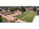 Expansive horse property with a paddock, riding arena and lush green pastures for equestrian enthusiasts at 4145 W Banff Ln, Phoenix, AZ 85053