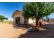 Tan barn with greenery nearby offering shade and access to outdoor space at 4145 W Banff Ln, Phoenix, AZ 85053