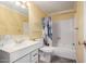 Bright bathroom featuring a shower/tub combo, white fixtures, and functional layout at 4145 W Banff Ln, Phoenix, AZ 85053