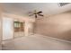 Spacious bedroom with mirrored sliding closet doors and neutral carpeting at 4145 W Banff Ln, Phoenix, AZ 85053