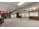 Spacious garage with ample lighting and storage, plus a view of the horse property at 4145 W Banff Ln, Phoenix, AZ 85053