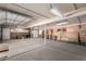 This is a spacious workshop-style garage with tools and room to work at 4145 W Banff Ln, Phoenix, AZ 85053