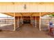 Interior view of horse pens featuring metal posts, metal gates and a dirt floor at 4145 W Banff Ln, Phoenix, AZ 85053