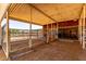 Spacious horse stalls with metal fencing, offering ample room for horses at 4145 W Banff Ln, Phoenix, AZ 85053