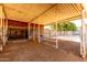 View of covered horse stalls offering ample space and shelter for horses at 4145 W Banff Ln, Phoenix, AZ 85053