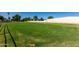 Expansive grass pasture perfect for livestock or recreational activities at 4145 W Banff Ln, Phoenix, AZ 85053