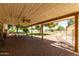 Shaded brick patio with overhead fans, great for outdoor entertaining and relaxation at 4145 W Banff Ln, Phoenix, AZ 85053