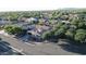 Panoramic aerial view showcasing the home's location within a lush, green neighborhood at 4277 E Blue Sage Ct, Gilbert, AZ 85297