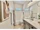 Well-lit bathroom with a combination shower and tub, a vanity, and modern fixtures at 4277 E Blue Sage Ct, Gilbert, AZ 85297