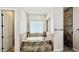 Luxurious bathroom features a soaking tub on a tile platform and a separate shower at 4277 E Blue Sage Ct, Gilbert, AZ 85297