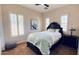 Cozy bedroom with shuttered windows, a comfortable bed, and soft decor for a relaxing ambiance at 4277 E Blue Sage Ct, Gilbert, AZ 85297