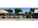 Enjoy the community pool with shaded lounge areas and a splash pad, perfect for Gathering fun and relaxation at 4277 E Blue Sage Ct, Gilbert, AZ 85297