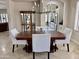 Dining room showcasing a stylish chandelier and furniture with easy access to kitchen at 4277 E Blue Sage Ct, Gilbert, AZ 85297