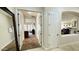 Hallway showcasing neutral paint and flooring leading to various rooms within the home at 4277 E Blue Sage Ct, Gilbert, AZ 85297