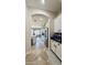 Bright kitchen boasts white cabinets and stainless steel appliances, seamlessly connecting to the dining area at 4277 E Blue Sage Ct, Gilbert, AZ 85297