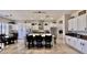 An open-concept kitchen with a central island, modern appliances, and stylish pendant lights at 4277 E Blue Sage Ct, Gilbert, AZ 85297