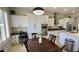Bright eat-in kitchen with stainless appliances, double ovens, work space and ample white cabinetry at 4277 E Blue Sage Ct, Gilbert, AZ 85297
