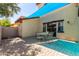 Inviting outdoor space with blue shade cover, paver patio, string lights and a patio set at 4682 E Redfield Rd, Gilbert, AZ 85234