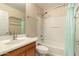 Bathroom with a tub, sink with chrome faucet, and light turquoise towel at 4682 E Redfield Rd, Gilbert, AZ 85234
